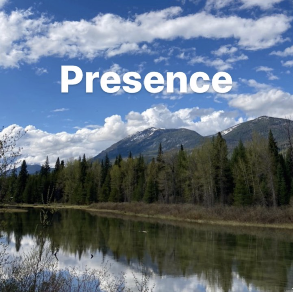 photo of a river with trees, mountains, blue sky, and clouds. The word "presence" is overlaid in the sky. 